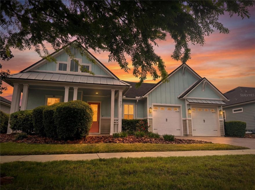 No need to wait for months of construction! Ready now, this stunning 2018 Oakmont Belaire by ICI Homes is loaded with upgrades and provides an exceptional value when comparing to a new home. Including a $7,500 buyer closing cost incentive being offered by the motivated sellers. Thoughtfully crafted with a true three-way split floor plan, the home offers 4 spacious bedrooms, 3 full baths, and a private study with elegant double doors. From the inviting covered entryway, step through the grand front door into a gracious foyer framed by a gallery hallway and a formal dining room. The oversized great room is the heart of the home, featuring retractable sliders that flood the space with natural light and create seamless indoor/outdoor living—perfect for entertaining. The gourmet kitchen is a chef’s dream, boasting a natural gas cooktop, stainless steel GE appliances, subway-pattern tile backsplash, farmhouse sink, 42" wood cabinetry, and a large center island. A generous casual dining area sits just steps away, making everyday living effortless. Retreat to the luxurious owner’s suite, complete with dual vanities, a spacious walk-in closet, and an impressive walk-in shower with dual showerheads and floor-to-ceiling tile. And then—your favorite spot awaits. The elegant covered lanai offers a serene outdoor living space anchored by a cozy, gas fireplace. With natural gas pre-plumbing and a vented hood already in place, your future summer kitchen is ready for your grill of choice. Premium features throughout include: Tray ceilings with crown molding, Porcelain plank tile flooring, Plantation shutters, Natural gas, Surround sound speakers, Central vacuum, Security system, Tankless water heater, Brick paver driveway and lanai …and so much more. All of this is just a short stroll from Oakmont’s resort-style amenity center, offering a state-of-the-art fitness facility, grand gathering room, basketball courts, sand volleyball, tennis & pickle ball courts, amphitheater, children’s playground and splash area, resort-style pool with lap lanes, and a multi-purpose activity field. Conveniently located near UF/Shands, North Florida and VA hospitals, Publix marketplace, tons of shopping and dining featured in the Celebration Pointe and Butler Plaza town centers.