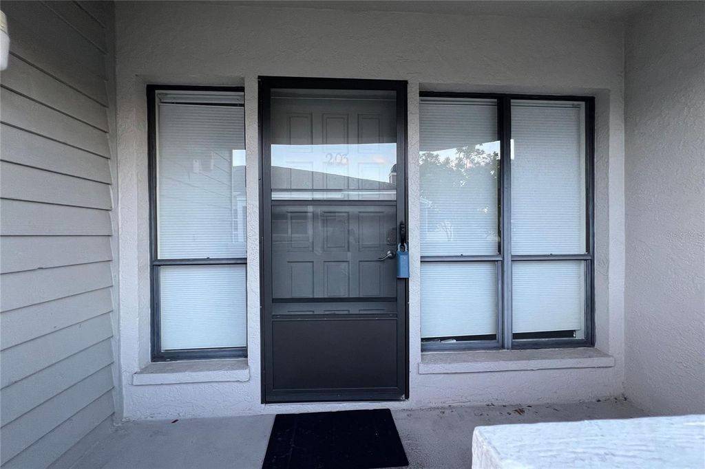 Photo of 10606 Longwood Drive #203B, Seminole, FL 33777 (MLS # TB8443711)