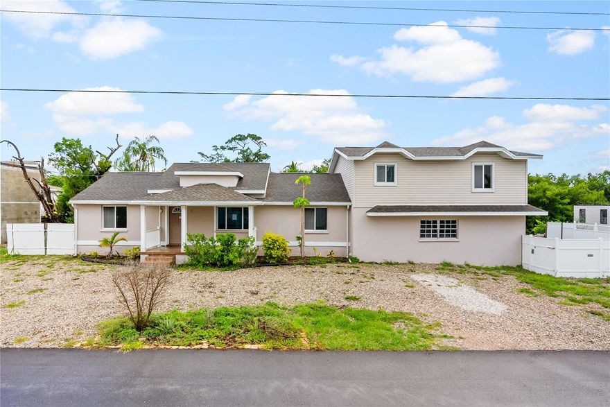 * * DO NOT MISS OUT ON THIS LONGBOAT SPECIAL * * MULTIPLE USES ARE AVAILABLE TO YOU * * Presently set up as a 3 bedroom / 2 bathroom / 2 car garage home with a formal living room.  Completely updated kitchen that provides access to a family room and attached reading room.  Oversized 2 car garage with a FULL INLAW SUITE above the garage.  INLAW SUITE has a huge living room.  Kitchen that opens to dinette. One bedroom and a one bathroom.  It has two separate entrances (one from inside home and one with direct access to outside).  Large balcony off the living room. FOR THE DEVELOPER - Large quarter acre lot that is 123' wide.  Lots of space to build that dream home.  Previous marketing indicates private deeded beach access (this statement is not warranted, and buyer needs to verify).  EVERYONE WANTS TO LIVE ON LONGBOAT KEY.  This is paradise at its best!  Multiple golf courses on the island and easy access to more on the mainland.  Go north and enjoy Bradenton Beach and Anna Maria and all that they have to offer.  Go south and enjoy St. Armands Circle or Downtown Sarasota.  All of the shopping and restaurants you could want!  If you are a boater, multiple marinas locally to handle all of your boating needs. * * PLEASE NOTE * * It is buyer’s responsibility to verify all information. Information posted in MLS or any marketing information is not guaranteed.