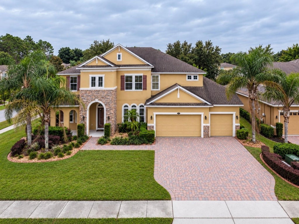 Photo of 1125 Harmony Lane, Clermont, FL 34711 (MLS # O6451899)