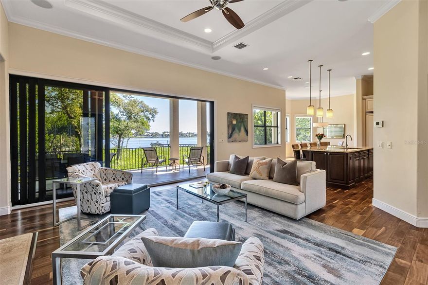 Beautiful Custom Built Waterfront Home on Casey Key. This waterfront residence on exclusive Casey Key, offering the ultimate in coastal luxury with deeded Gulf beach access and a deep-water dock on the Intracoastal Waterway. Designed for effortless indoor-outdoor living, this open-concept home features a spacious great room with decorative fireplace and a gourmet kitchen with Viking Professional Series appliances, walk-in pantry, and large center island.

Walls of glass open to expansive outdoor living spaces with a summer kitchen, balcony, and sparkling pool, creating a seamless setting for entertaining and relaxation. All four bedrooms feature private en-suite baths with TOTO and Kohler fixtures and designer finishes in natural stone, porcelain, glass, and metal. The oversized primary suite is a private retreat with generous proportions and luxurious detail.

Exceptional quality throughout includes hurricane-rated windows and doors, granite and marble countertops, 8-foot solid-core doors, crown molding, elegant millwork, oversized garage, elevator-ready design, and whole-house generator. Custom built to Florida Green Building Standards for energy efficiency and environmental sensitivity. 

Enjoy one of Casey Key’s most coveted lifestyles.  Ideally located near downtown Sarasota’s acclaimed dining and cultural offerings, as well as the charming shops and waterfront restaurants of Venice. Convenient to three major airports and the private airport in Venice.