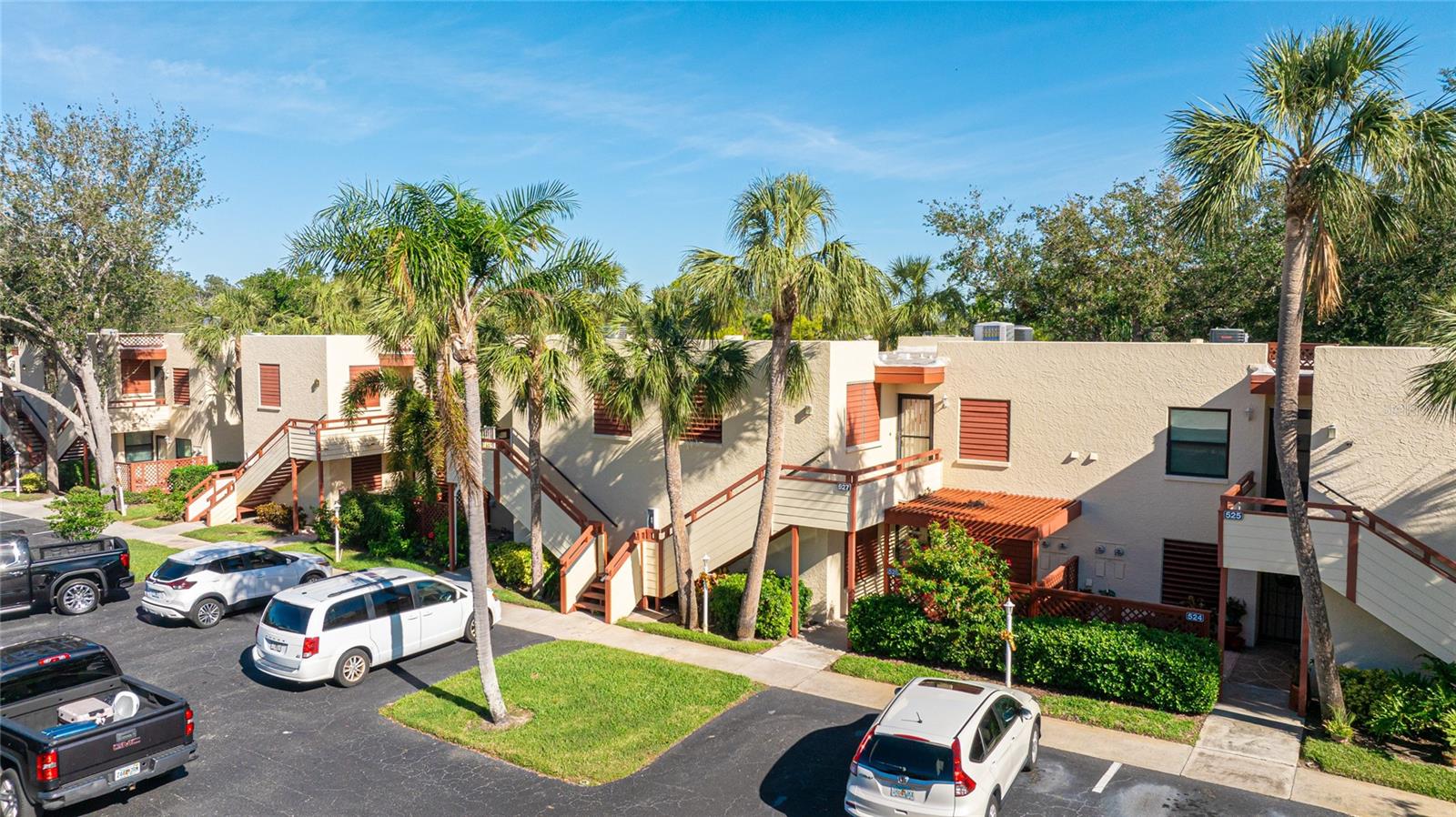 **THIS PROPERTY QUALIFIES FOR A 1% LENDER INCENTIVE IF USING PREFERRED LENDER. INQUIRE FOR MORE DETAILS.** Welcome to Spring Lakes! This 2nd-floor condo features 2 bedrooms and 2 bathrooms, with each bedroom offering an ensuite bath. The primary bedroom includes a walk-in closet and sliders that open to the screened-in lanai, where you’ll enjoy views of the community pool and spa. The spacious kitchen features tile flooring, ample cabinetry, and an in-kitchen washer and dryer. The oversized great room, with carpeted flooring, opens to the lanai through large sliding glass doors, seamlessly connecting indoor and outdoor spaces. A large storage closet on the lanai adds extra convenience. Updated appliances include AC, disposal, water heater, and dishwasher. This condo also offers assigned parking and generous storage throughout. Spring Lakes is a beautifully maintained community with amenities like tennis courts, a pool, and a spa. Located near Cortez Road West, you’re minutes from shopping, dining, and entertainment. The beaches of Cortez and Anna Maria Island are 15 minutes away, downtown Sarasota is 30 minutes, and SRQ Airport is just a 17-minute drive. I-75 access is within 25 minutes.
