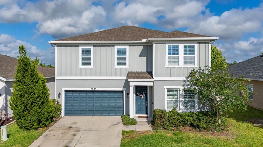 SAVE BIG: Mortgage Broker credit (based on loan amount) toward closing costs or rate buy-down with seller’s preferred mortgage broker.
In gated Serenoa Village, this two-story home is designed for the rhythm of everyday family life. The downstairs layout offers open shared spaces where cooking, helping with homework, and keeping an eye on playtime can all happen at once, with views to the backyard through the sliding glass doors. Just off the entry, a separate room provides flexibility for formal dining, a play space, or a quiet sitting area. Ceramic tile throughout the main level makes cleanup simple, while upgraded carpet adds comfort upstairs along the staircase, hallway, and all bedrooms. With all bedrooms located on the second floor, the home offers separation between entertaining and private spaces. Outside, the backyard features side fencing, two trees along the rear property line, a paved patio area for casual outdoor time, and an existing swing set. Serenoa Village residents enjoy a gated entrance, community pool, and convenient access to schools, daycare, parks, shopping, dining, major roadways, and the attractions of the Disney area.