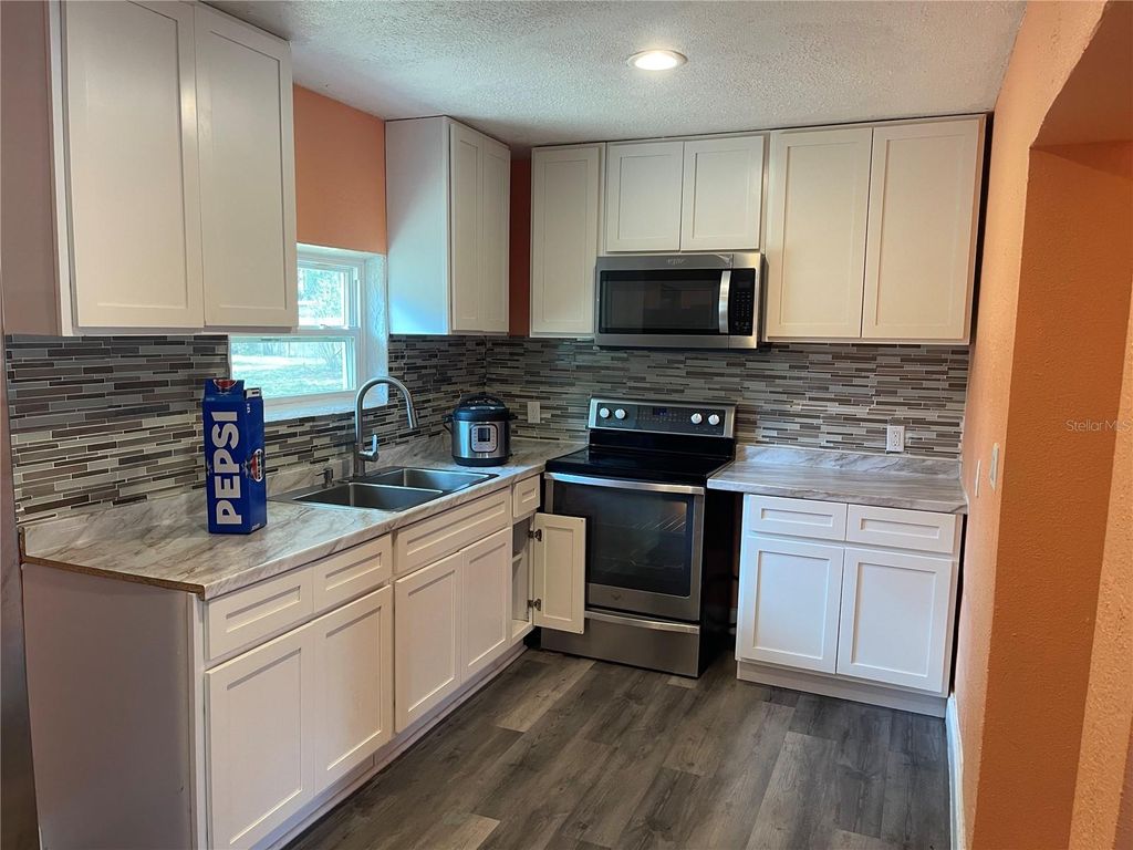 Photo of 1701 36th Street NW, Winter Haven, FL 33881 (MLS # S5143914)