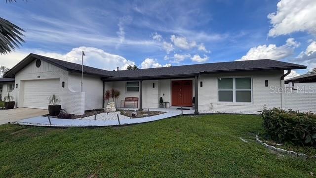 Beautifully updated 4BR/2BA home featuring an open-concept layout, gourmet kitchen with granite counters, stainless steel appliances, and a spacious island. The primary suite offers dual closets and a spa-like walk-in shower. Enjoy Florida living with a screened-in pool, outdoor kitchen, and low-maintenance yard. A thoughtfully added second kitchen provides extra convenience for accommodating multi-generational living. Move-in ready and perfect for entertaining!