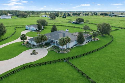 Photo of 2655 NW 102nd Boulevard, Wildwood, FL 34785 (MLS # OM716761)