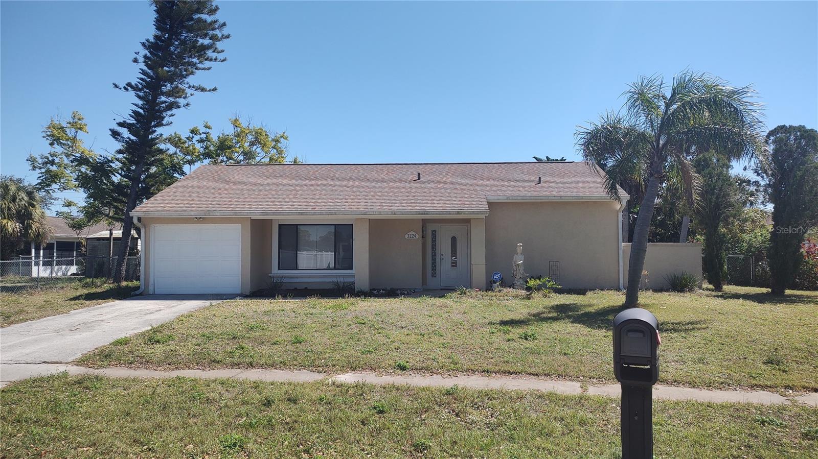 Solid 2 bedroom 2 bath home in a good location. New roof in 2023. 1 car garage. Large vinyl enclosed lanai. Large kitchen, inside utility room.