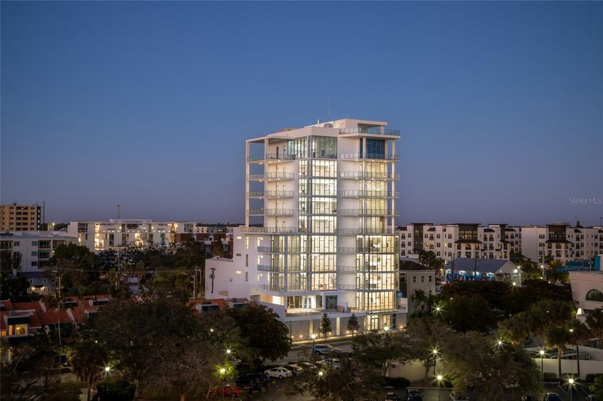 One or more photo(s) has been virtually staged. This is your last opportunity to own the final masterpiece in an exclusive collection of 12. Completed in 2023, Residence 501 at The Collection is the only brand new, move-in ready condo in the core of downtown Sarasota. Spanning over 3,330 square feet, the remarkable West-facing residence delivers 3 bedrooms, 3 and a half baths, plus a den – presenting a lavish expanse usually reserved for single-family homes. Illuminated by the Sarasota sun, the open living area has been crafted with passion, imagination, and attention to every luxurious detail. Living, dining, and kitchen spaces blend effortlessly beneath soaring ceiling heights, with vast windows standing up to 12 feet tall. These grand windows provide a stunning perspective of the Sarasota skyline, over blazing sunsets, glittering city lights and one of the world’s most beautiful bays on the horizon. Meticulous craftsmanship is evident in the custom-designed painted cabinetry, waterfall quartz surfaces, floating vanities, large tile throughout, gas range and exquisite Miele appliances. More than a residence, this is a lifestyle redefined, where you can indulge in a pinnacle resort atmosphere from home. Step out from your private elevator lobby for access to the luxurious pool, spa, cabanas, fire table, grill, community room, board room, sauna, fitness center and assigned climate-controlled storage. The amenities truly feel like an extension of your private residence, infusing wellness and relaxation into each day. With electric car charging capabilities and 3 private parking spaces available, you are easily connected to city life. A true urban oasis nestled on a quiet street, this is a place where convenience and class unite: walk to Whole Foods, artisan coffee shops, an array of restaurants, galleries, boutiques and theatres. Here, you can relish in the dynamic energy of downtown living. The Collection is a testament to the extraordinary, where an artful existence has been distilled into a way of life. Don’t miss the final offering to be one of the 12 original owners.