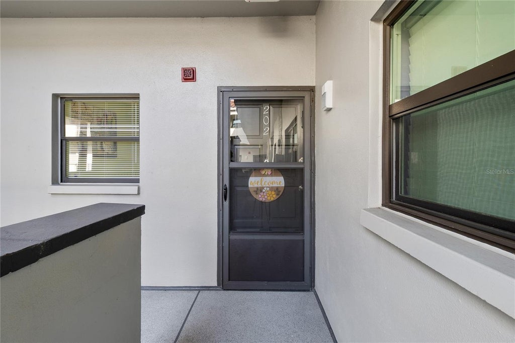 Photo of 2650 Countryside Boulevard #F202, Clearwater, FL 33761 (MLS # TB8554238)