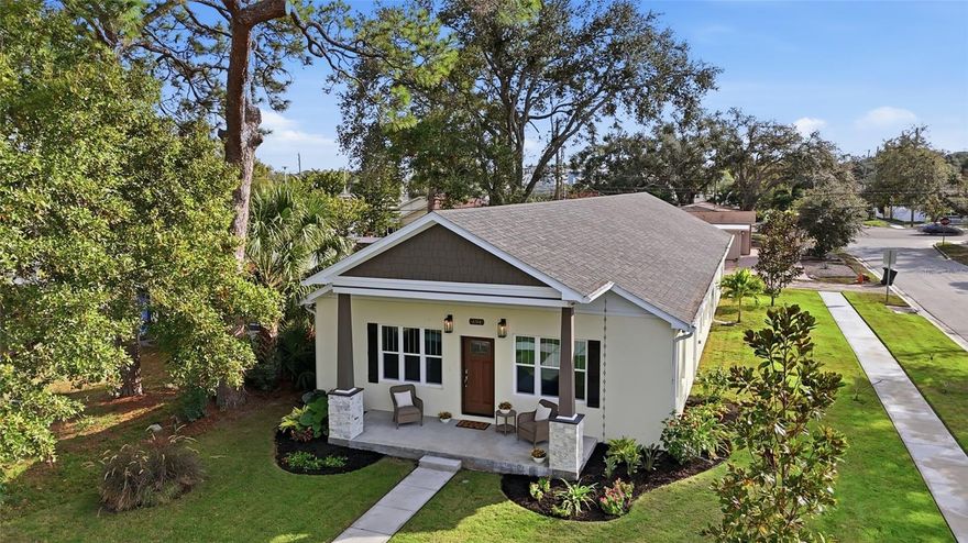 One or more photo(s) has been virtually staged. An exceptional opportunity to own a thoughtfully crafted, custom single-story residence in the heart of St. Petersburg’s coveted Allendale/ Five Points district - beautifully designed, meticulously built, and outside of a flood zone. This 2,200 SF, 3 bedrooms, 2.5 bath block home blends timeless design with modern performance, featuring impact-rated low-E windows and doors, refined luxury vinyl plank flooring, custom closets, and a one of a kind chef’s kitchen appointed with painted cabinetry to the ceiling, quartz countertops, herringbone backsplash, an expansive island, upgraded Samsung appliances, and elegant under-cabinet lighting. The primary suite offers a spa-like retreat with a soaking tub, marble walk-in shower, and dual vanities. Beyond its striking aesthetic, this home exceeds standard construction with mechanical upgrades rarely found in new builds, from the open-cell spray foam insulation for superior energy efficiency and sound control, the 30-year architectural shingle roof with 5-year labor warranty, to the recirculation pump that delivers instant hot water throughout the home. Also constructed for your comfort with app-controlled Rheem HVAC, CAT 5e and USB pre-wiring, and infrastructure for future whole-home water filtration. A two-car EV ready garage with insulated door, additional attic storage, exterior clean-out connection for an RV, adds daily convenience. Every detail was designed with intention. Outdoors, sustainable landscaping is supported by a private well-pump irrigation system, complemented by magnolia trees, coastal grasses, rain chains, and leaf-filter gutters. Ideally situated just blocks from Tampa Bay and a short walk to Coffee Pot Park, neighborhood cafés, shops, and dining, this residence offers a rare combination of luxury living, intelligent construction, and an irreplaceable St. Petersburg location. This is not just a beautiful new home, it’s a smart, energy-efficient investment designed to perform for years to come.