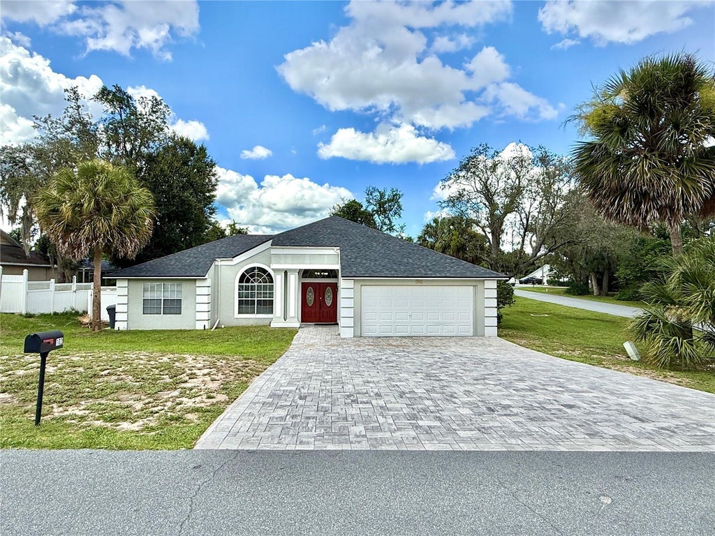 Photo of 102 Titan Drive, Davenport, FL 33837 (MLS # O6438171)