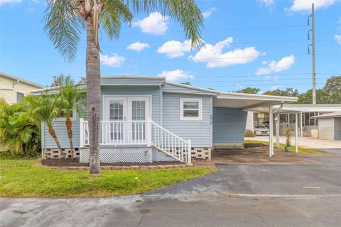 Photo of 6830 Americana Drive NE #127, St Petersburg, FL 33702 (MLS # TB8554729)