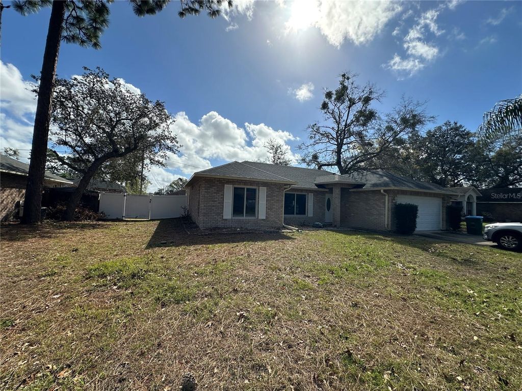Photo of 1592 Langan Avenue, Deltona, FL 32738 (MLS # O6388149)