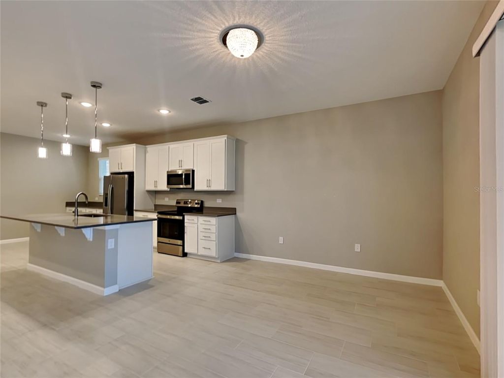 Photo of 1944 Chickasaw Boulevard, Davenport, FL 33837 (MLS # O6385298)