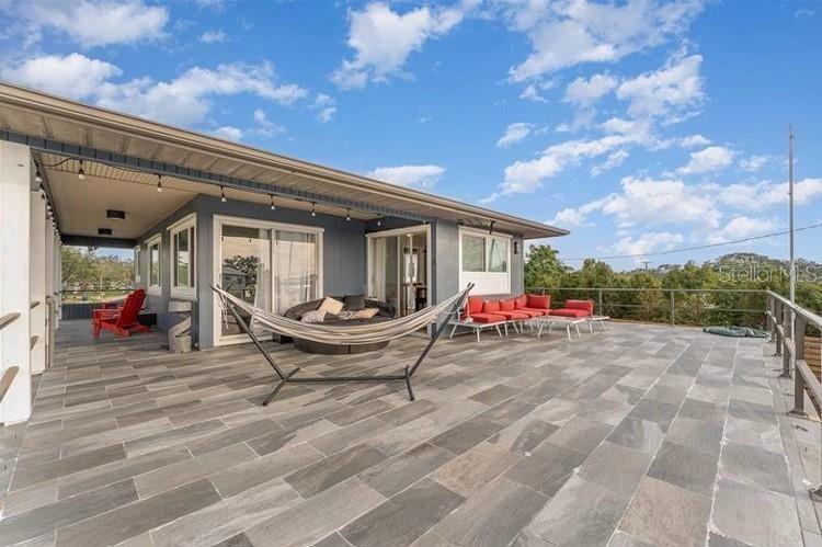 Modern Coastal Retreat in Boating Community – Minutes to Siesta Key Beach! Perfect for renters seeking a luxury Florida lifestyle.Welcome to your perfect Sarasota getaway! Located in the highly desirable Tropical Shores neighborhood, this stunning rental offers the ideal blend of relaxation, style, and location. Just 5 miles from Siesta Key Beach and close to Nokomis Beach, Casey Key, and the Intracoastal Waterway, you’ll enjoy the best of the Florida lifestyle — sun, sand, and water — right at your fingertips. This renovated second-floor apartment, with its own private entrance features: a blend of contemporary and classic features, stunning hardwood floors, Kings-size bed, a walk-in shower, a bright and spacious living area that opens to a breezy, private, furnished deck with amazing views of Sarasota Bay. The perfect spot to entertain or spend some alone time relaxing in the hammock while you watch the gorgeous Florida sky. Head downstairs to enjoy the private swimming pool, lush tropical landscaping, and a fenced-in yard with fresh fruit trees. Boaters and outdoor lovers will appreciate the optional private marina access just around the corner. For a low annual fee, enjoy use of the boat ramp, slips, clubhouse, kayak storage, and picnic areas — all with no HOA restrictions. Bring your boat, paddleboards, or kayaks and launch right into the waters of Paradise. Walk to local shops, restaurants, and just a short drive to waterfront tiki bars, downtown Sarasota, and more! Whether you're booking a family vacation, planning an extended seasonal stay, or looking for a spacious work-from-home retreat, this property offers everything you need — and then some. Now accepting reservations – inquire today to book your stay at 1616 Livingstone Street and experience the best of Sarasota! RENTAL FEE: Off-Season: $1800/month* | Season: $2500/month* (*additional taxes and fees apply). 1 small to medium pet, up to 60 lbs permitted with $150 non-refundable pet fee and $500 refundable pet deposit.