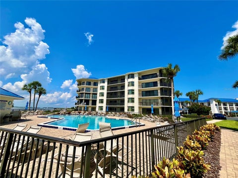 Photo of 2700 N Peninsula Avenue #322, New Smyrna Beach, FL 32169 (MLS # NS1089491)