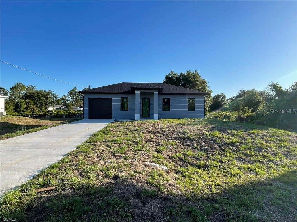 Photo of 707 Ledge Street, Lehigh Acres, FL 33972 (MLS # A4700751)