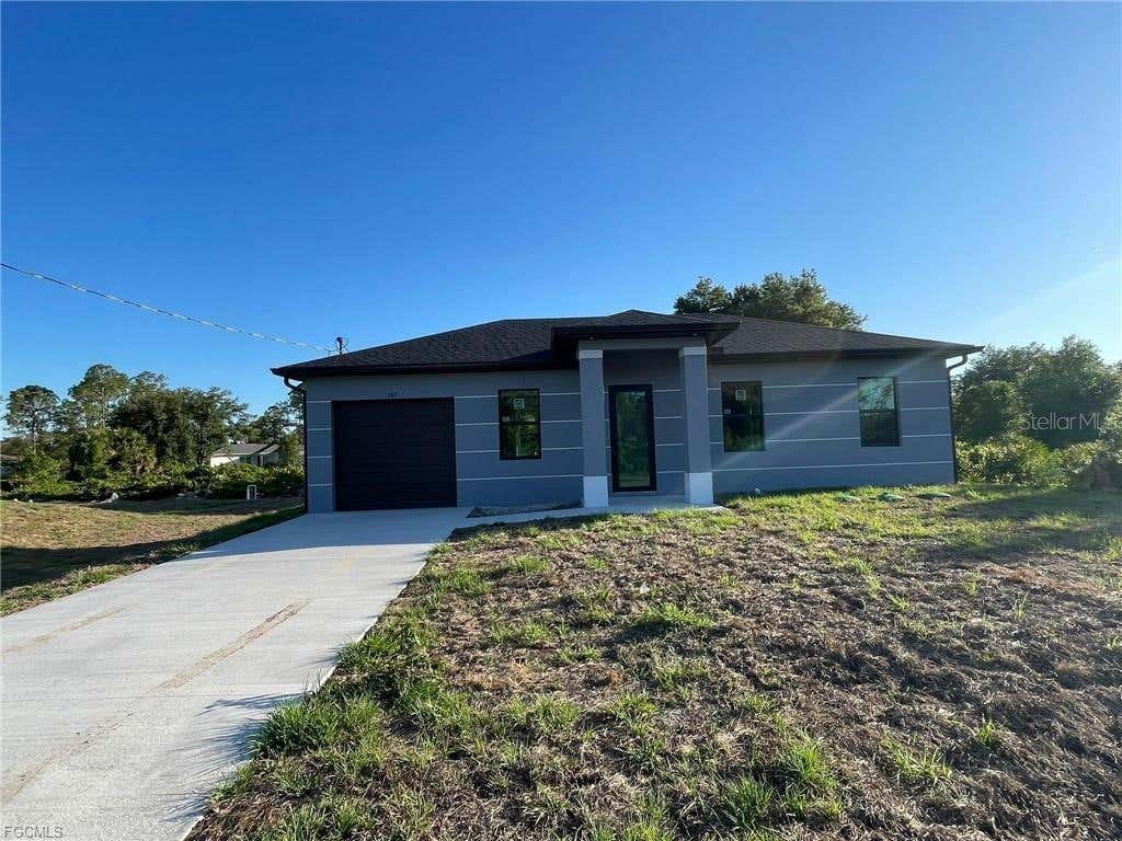 Photo of 707 Ledge Street, Lehigh Acres, FL 33972 (MLS # A4700751)