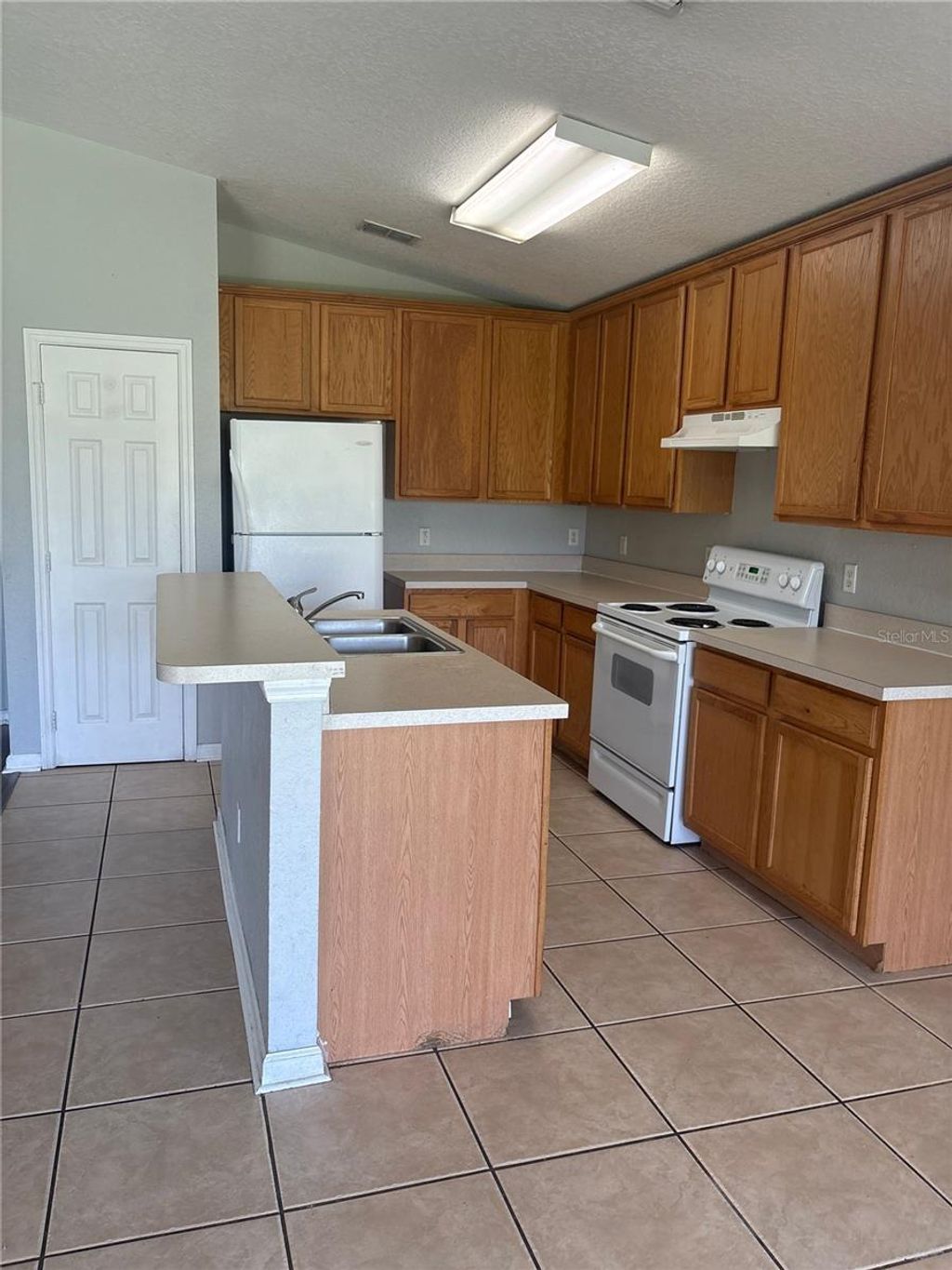 Photo of 2253 Meadow Oak Circle, Kissimmee, FL 34746 (MLS # S5148402)