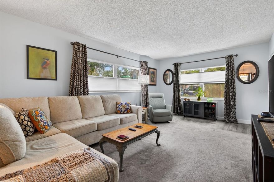 Start the New Year off right with a beautifully renovated condo. End unit. First floor. Updated kitchen with generous countertop space, dishwasher, etc.  Updated windows.  Updated bathrooms.  Bonus room at the back overlooking the lawn.  
Near Northwest Park with pool, tennis and pickleball courts, rec center, and playground.  About 10 minutes to Downtown St Pete.  And about 15 minutes to the beach!