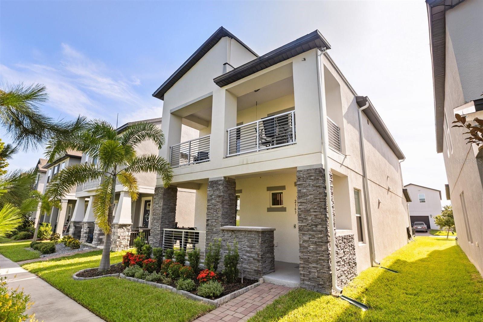 PRICED TO SELL! This recently built energy-efficient home, constructed by Meritage Homes in September 2019, boasts approximately $15,000 in furnishings, artwork, and pendant lighting—all negotiable with the purchase! Enjoy a large, covered front porch and a spacious open first floor. Upon entering, you'll find wood-look grey tile flooring that perfectly complements the cabinetry and walls, with no carpet downstairs. The open layout allows for seamless cooking and entertaining, with the kitchen, dining room, and living room all connected. This home features high ceilings, natural lighting, and a $3,000 light fixture installed by the owner. The kitchen includes quartz counters, stainless steel appliances, an overhead vented hood, and a deep stainless steel sink located in the center island overlooking the dining room, along with plenty of bar stool seating and a coffee bar for extra counter space. Upstairs, you'll find ample natural light, modern metal railings overlooking the dining and living areas, and convenient access to the upstairs laundry room. The master suite features abundant natural lighting, a ceiling fan, and a walk-in closet, while the master bath includes French doors leading into the dual vanity, walk-in shower, and a separate door for the toilet area. With spray foam insulation in the attic and double-pane windows, this home is designed to keep the hot Florida heat outside, exceeding ENERGY STAR guidelines for energy efficiency. The two car garage is 2.5 ft wider on each side for 5ft of extra space or storage and the driveway is long enough for four vehicles! The Oakland Trails community offers a pool, playground, two dog parks, and a walking trail, conveniently located near Central Florida's major employment, Florida’s Turnpike and entertainment corridors, including Downtown Orlando, Walt Disney World, and Universal Studios. Enjoy the outdoors by riding your bike or walking to the Oakland Nature Preserve or the West Orange Bike Trail, just outside the neighborhood. Come see this beautiful home today!