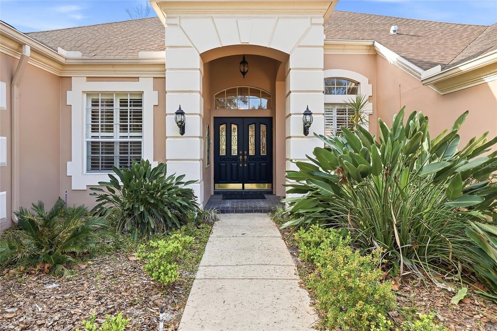 Photo of 4092 Carlyle Lakes Boulevard, Palm Harbor, FL 34685 (MLS # TB8465841)