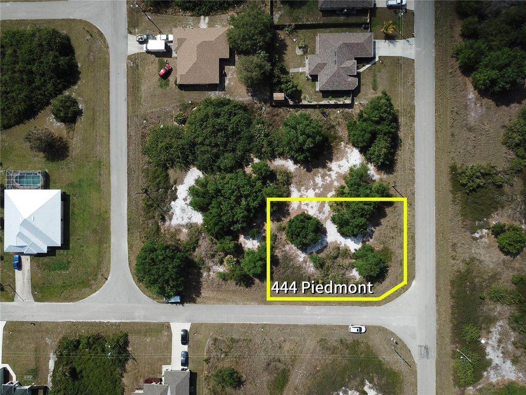Photo of 444 Piedmont Street, Lehigh Acres, FL 33974 (MLS # O6292498)