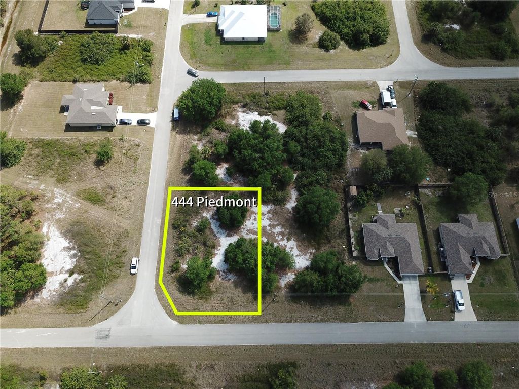 Photo of 444 Piedmont Street, Lehigh Acres, FL 33974 (MLS # O6292498)