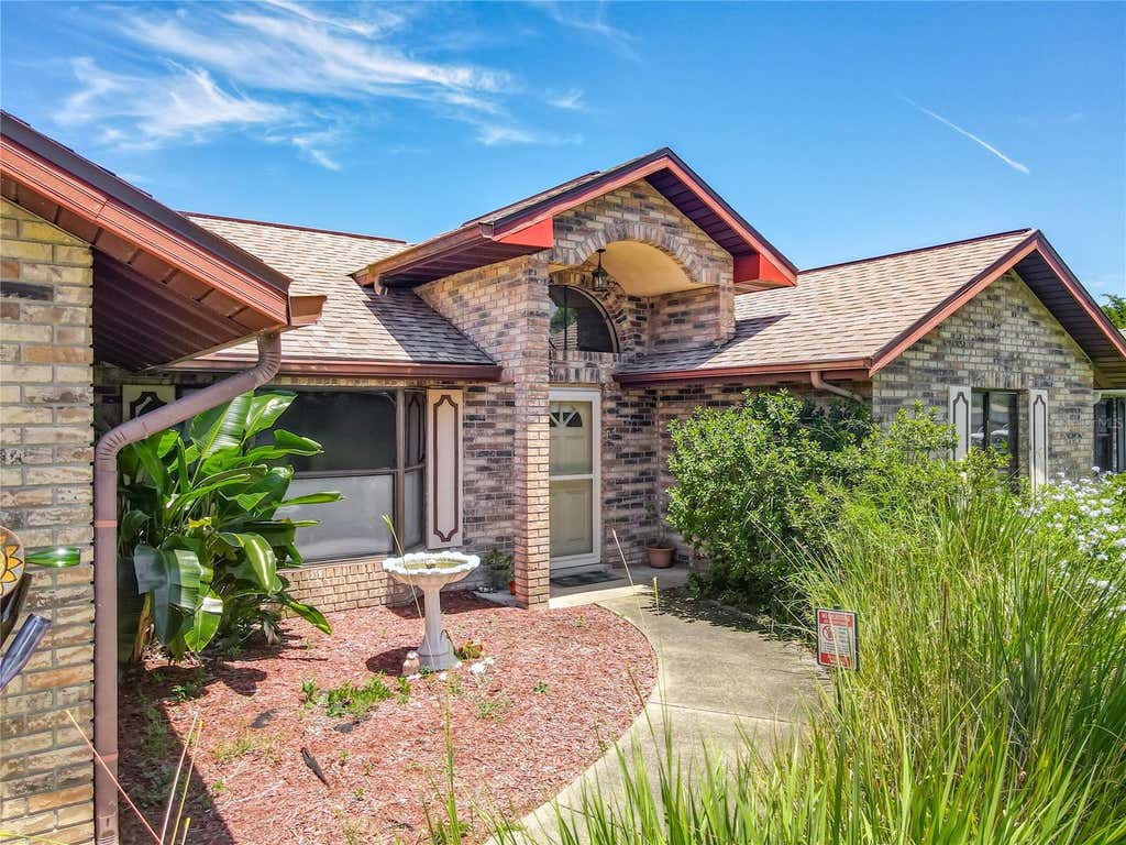 Photo of 209 Meadow Lake Drive, Edgewater, FL 32141 (MLS # NS1088802)