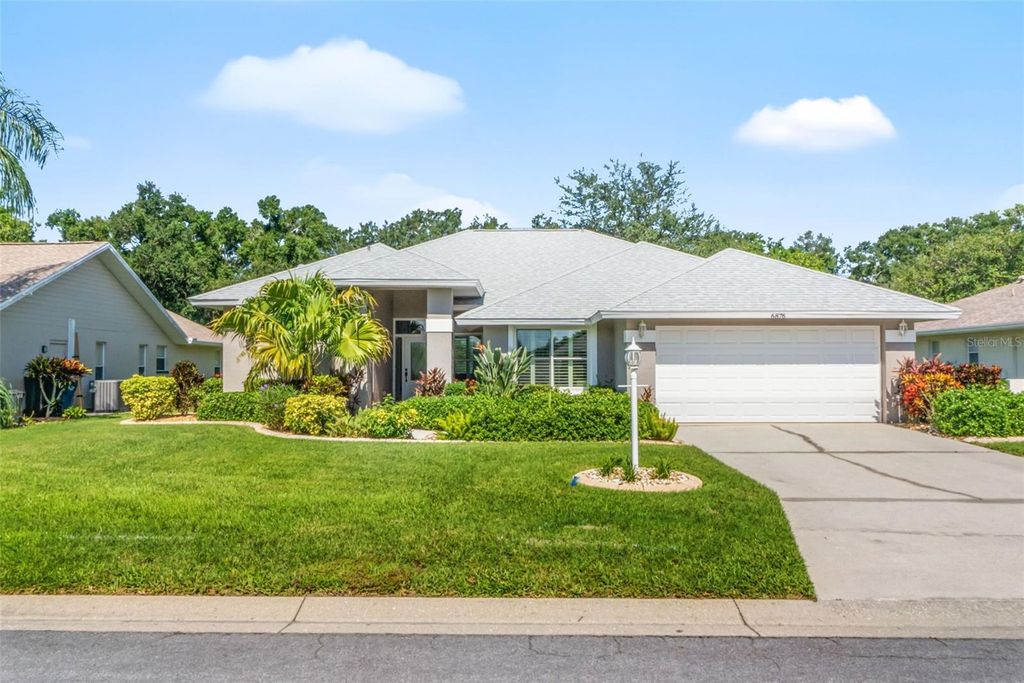 Photo of 6876 Corral Circle, Sarasota, FL 34243 (MLS # A4700845)