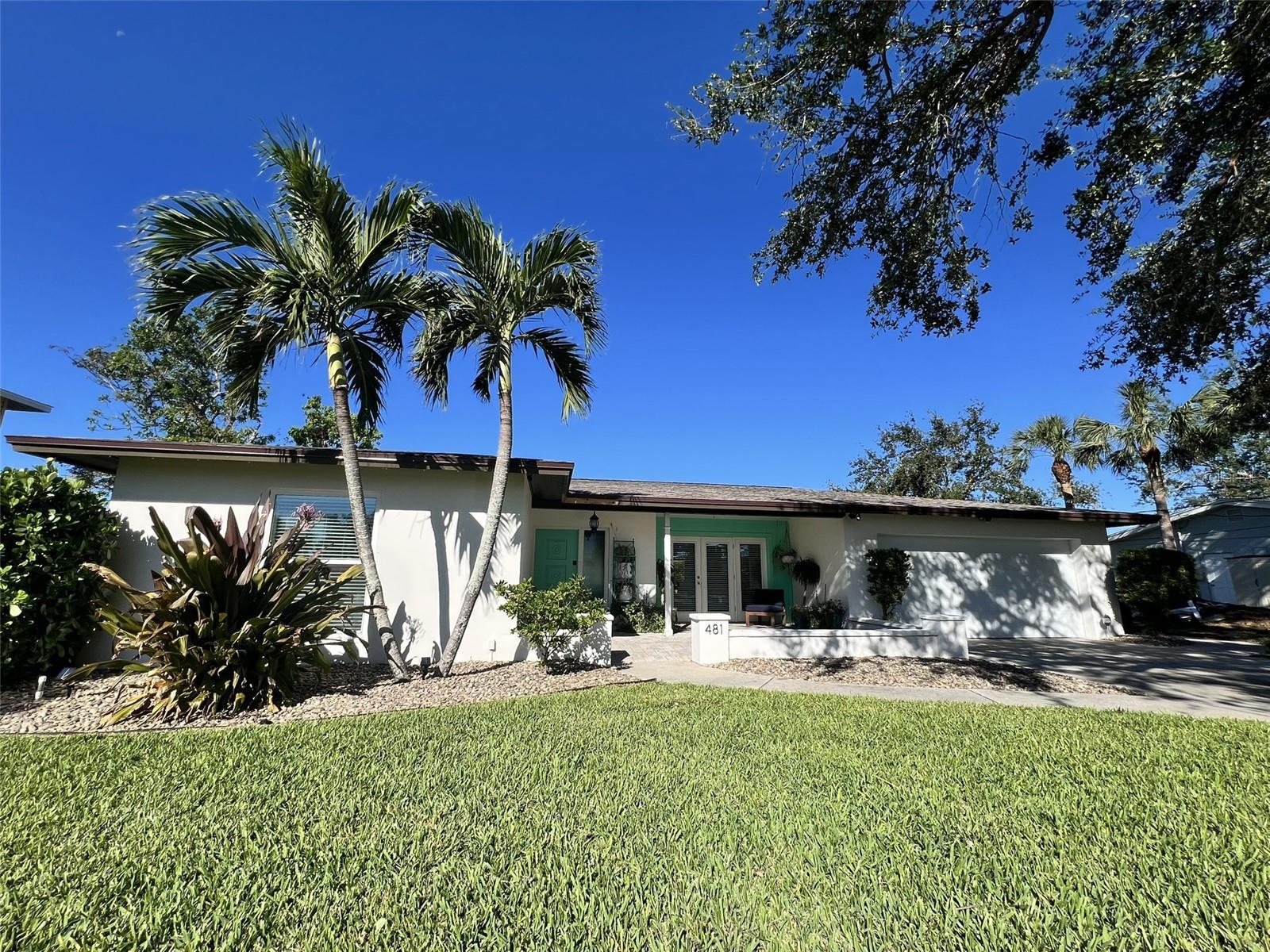 High and dry waterfront! No flooding or storm damage. Keep your boat in the backyard on the 10,000 lb boat lift and enjoy easy access to Sarasota Bay. Watch sunsets over the boat basin from the heated plunge pool / swim spa. Entire home has been updated in the last 5 years. Terrazzo and tile flooring throughout. 3 bedrooms and 3 full baths. Two car garage has a/c and can also be used as additional living space. Convenient central location near Downtown Sarasota, Bradenton, UTC and the beaches. Be on the water without getting stuck during season to get to and from your house. **Available May 1st, 2025. Annual rental. Available furnished or unfurnished. Rent includes water, lawn service and pool service. Short term rental also available.