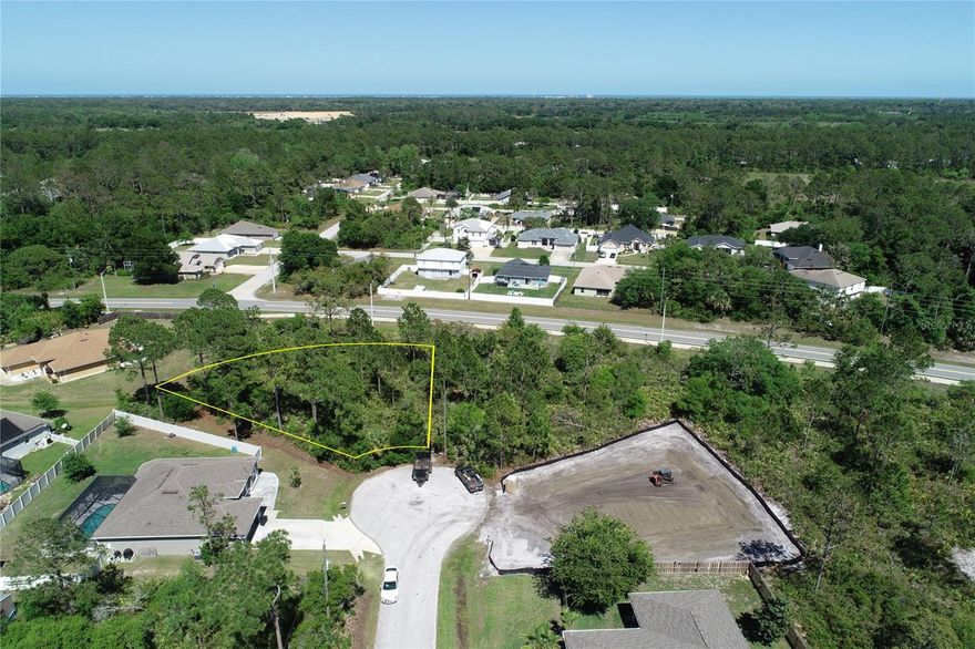 Lot in quiet cul-de-sac in Seminole Woods. No HOA. No CDD. Wooded space behind lot, owned by City of Palm Coast, provides extra privacy and space. Located 5.3 miles to Flagler Palm Coast High School, shopping, restaurants, and only 8.5 miles to Flagler Beach. Quick access to Interstate -95 for easy commute North to historic Saint Augustine- 36 miles- or South to Daytona Beach is only 22 miles.