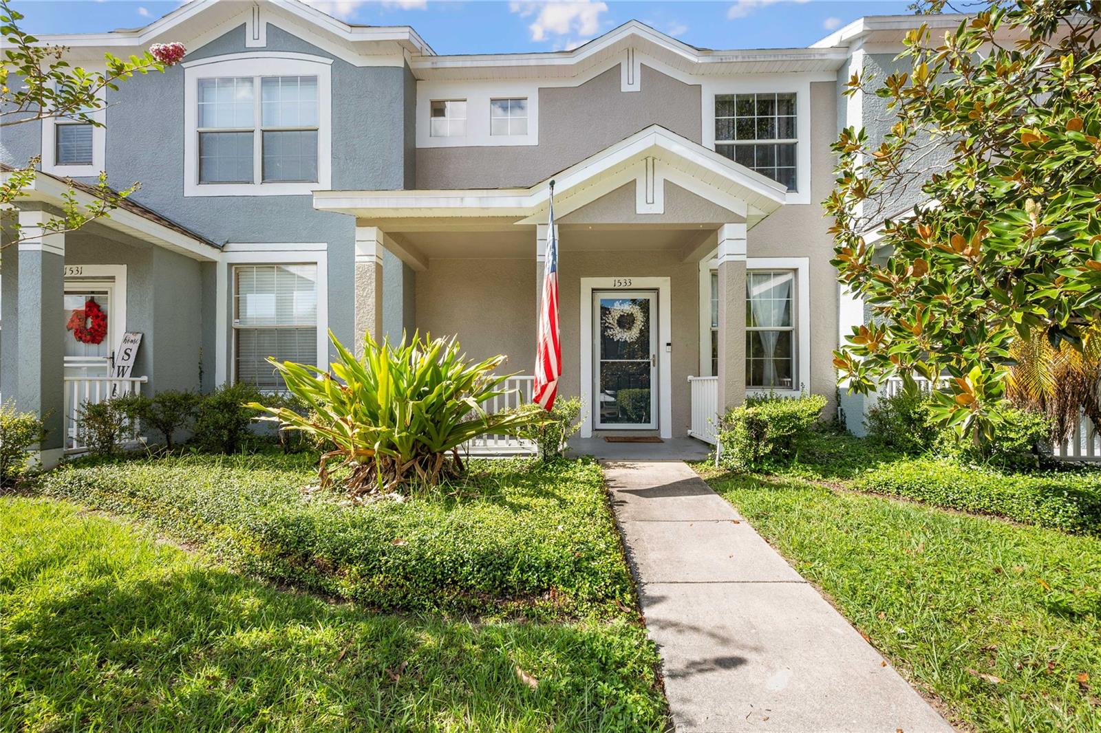 This charming townhome in the GATED community of Lakewood Ridge offers 2 bedrooms and 2.5 bathrooms. As you pull into one of your TWO ASSIGNED PARKING SPACES you immediately notice the inviting front porch to the home. The storm door at the front allows you to keep the elements out while allowing the natural light in. NEW (2024) waterproof LVP FLOORING was installed throughout the living and dining area as well as the upstairs. Downstairs the kitchen is equipped with all new (2024) matching GE STAINLESS STEEL APPLIANCES a food pantry, and inside laundry. Also downstairs is a half bath with a storage space under the stairs. Upstairs you will find two bedrooms with en-suite full bathrooms. The primary bedroom includes a spacious walk in closet. Other UPGRADES in 2024 / 2025 include; freshly painted doors and matte black door hardware, upstairs bathrooms were updated with fresh paint, new faucets, new sinks, new light fixtures and renovated cabinets / countertops / and mirrors. New fans in the bedrooms finish off the modern look with additional new fixtures in the landing and laundry areas. The living space continues outside to the stylish fully fenced backyard with low maintenance artificial turf and a decorative rock bed making it the perfect space for your entertaining, relaxing, pets, family and much more. Outside there is also a covered area and storage space. The home had a NEW ROOF in 2024. Trash and exterior paint are also covered with your HOA payments. The community also features 2 dog park areas, sidewalks, and a community pool. Conveniently located in the Brandon area close to shopping, restaurants, entertainment, I -75 and more!!