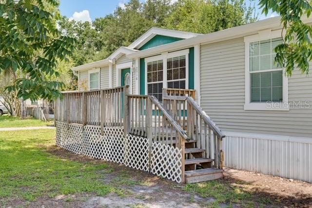 Photo of 2516 Mobilaire Drive, Lutz, FL 33559 (MLS # TB8530826)