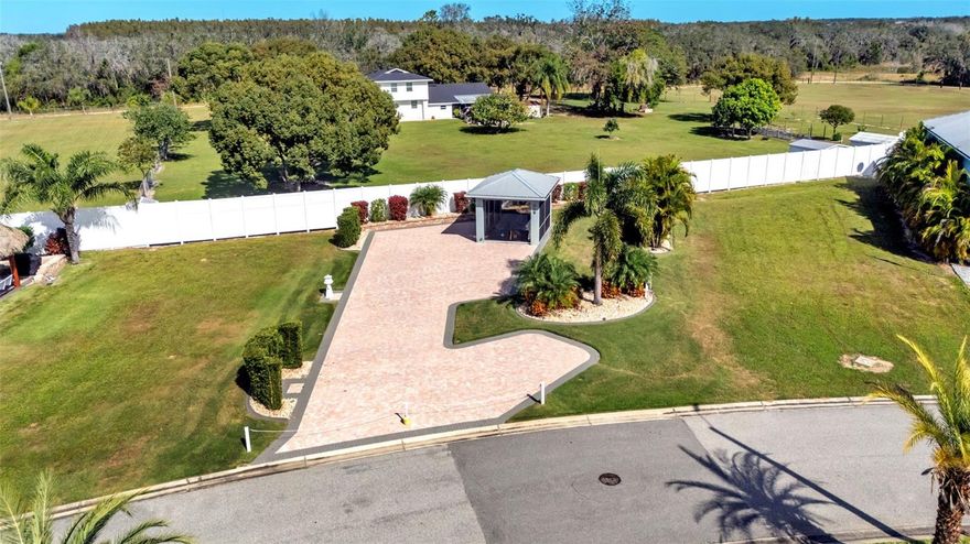 This gorgeous, oversized paver pad is the perfect place to park your motorcoach and start enjoying the resort lifestyle. The property features a beautiful, custom-built screened pavilion, offering the ideal bug-free space for outdoor dining, entertaining, or simply relaxing with a view. The lot includes mature landscaping providing privacy and a tropical feel. This is a must-see property, ready for you to move in!

Featuring: Oversized Paver Pad, Custom Screened Pavilion, Mature Landscaping, Great Location!

Bay Lake Motorcoach Resort is a Class A motorcoach resort offering incredible amenities. Owners and visitors can fill their days with activities and club outings or simply relax and enjoy the resort. Whether in search of community, travel, relaxation or recreation, Bay Lake is your home base for the Florida Lifestyle.