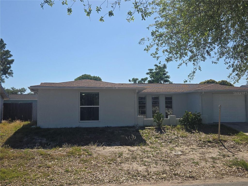 Photo of 11014 Tamarix Avenue, Port Richey, FL 34668 (MLS # TB8499246)
