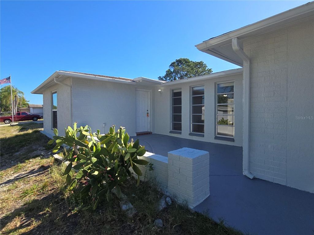 Photo of 11014 Tamarix Avenue, Port Richey, FL 34668 (MLS # TB8499246)