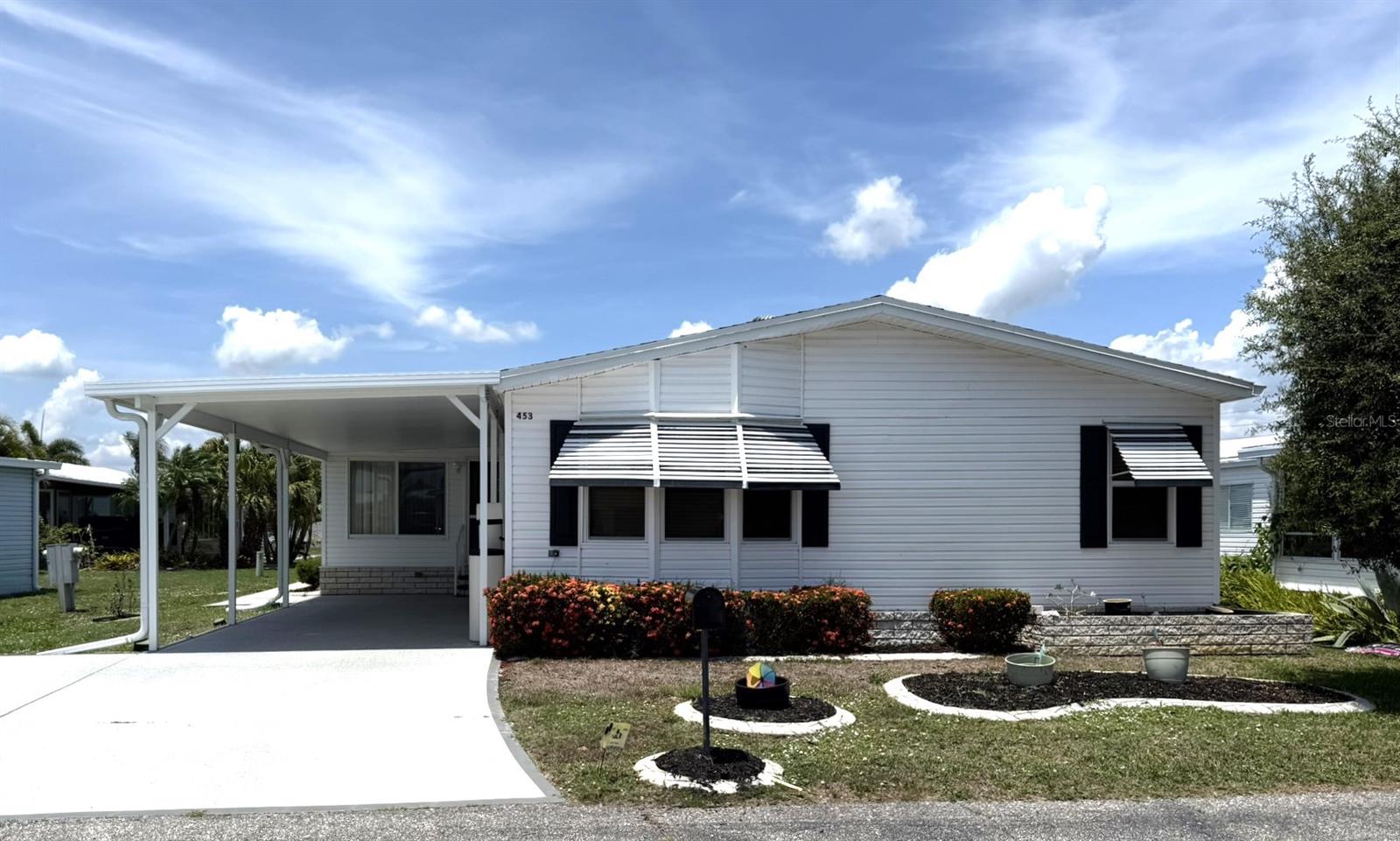 Welcome to this spacious and well-maintained one-owner home located in the highly desirable pet-friendly, land-owned community of Harbor Isles. Offering 1,450 sq ft of comfortable living space, this 3 bedroom, 2 bathroom manufactured home is full of modern updates and thoughtful features. Step into the remodeled kitchen, where you'll find granite countertops, solid wood cabinetry, and luxury vinyl flooring that combines style with durability. A bright and cheerful eat-in area is lined with extra cabinets and counter space—perfect for casual dining or entertaining. The indoor laundry room adds convenience, while vaulted ceilings throughout the home create an open and airy atmosphere. Just off the kitchen is a brand-new Florida room, ideal for relaxing with guests or enjoying quiet mornings with a cup of coffee. Additional updates include a new roof (2023), A/C (2019), hot water heater (2023), updated windows, and a whole-house water softener. A good-sized shed behind the home provides ample storage for tools, beach gear, or hobby supplies.
While the home could use a bit of TLC, it is priced with the updates in mind, offering a wonderful opportunity to personalize and make it your own. Harbor Isles is a sought-after, active 55+ waterfront community where you own your land and enjoy a wide range of resort-style amenities. Residents have access to a heated pool and spa, clubhouse, tennis and pickleball courts, shuffleboard, a fitness center, and a marina with boat slips and kayak launch. Located near Gulf beaches, shopping, dining, and cultural attractions, Harbor Isles offers the perfect blend of convenience and leisure for coastal Florida living. Don’t miss your chance to live in one of the area's most popular communities—schedule your showing today.