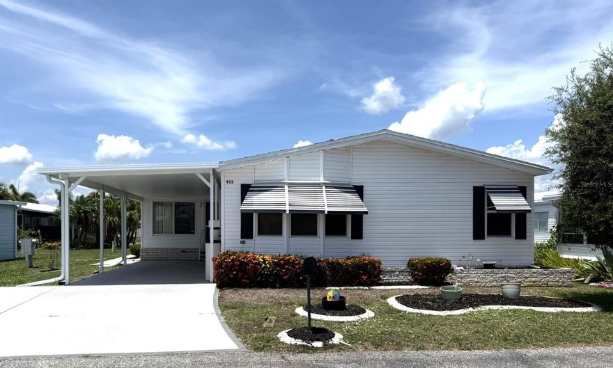 Welcome to this spacious and well-maintained one-owner home located in the highly desirable pet-friendly, land-owned community of Harbor Isles. Offering 1,450 sq ft of comfortable living space, this 3 bedroom, 2 bathroom manufactured home is full of modern updates and thoughtful features.  Step into the remodeled kitchen, where you'll find granite countertops, solid wood cabinetry, and luxury vinyl flooring that combines style with durability. A bright and cheerful eat-in area is lined with extra cabinets and counter space—perfect for casual dining or entertaining. The indoor laundry room adds convenience, while vaulted ceilings throughout the home create an open and airy atmosphere.  Just off the kitchen is a brand-new Florida room, ideal for relaxing with guests or enjoying quiet mornings with a cup of coffee. Additional updates include a new roof (2023), A/C (2019), hot water heater (2023), updated windows, and a whole-house water softener. A good-sized shed behind the home provides ample storage for tools, beach gear, or hobby supplies.
While the home could use a bit of TLC, it is priced with the updates in mind, offering a wonderful opportunity to personalize and make it your own.  Harbor Isles is a sought-after, active 55+ waterfront community where you own your land and enjoy a wide range of resort-style amenities. Residents have access to a heated pool and spa, clubhouse, tennis and pickleball courts, shuffleboard, a fitness center, and a marina with boat slips and kayak launch. Located near Gulf beaches, shopping, dining, and cultural attractions, Harbor Isles offers the perfect blend of convenience and leisure for coastal Florida living.  Don’t miss your chance to live in one of the area's most popular communities—schedule your showing today.