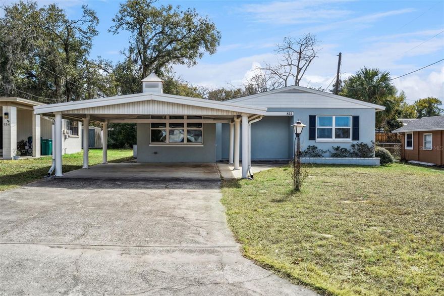 Charming Lake Gracie Retreat | 3 Bedrooms | 2 Baths | 1,912 Sq. Ft.

Welcome to this timeless 1949 charmer tucked away on a quiet cul de sac in Eustis’ desirable Lake Gracie area. Offering 1,912 square feet of thoughtfully maintained living space on a generous (huge) 0.33-acre lot, this home blends vintage character with everyday functionality.

Inside, you’ll find a spacious and flexible floor plan featuring three bedrooms and two full baths, highlighted by an impressive 20x20 primary suite complete with a large walk-in closet and private en-suite bath. Original wood floors add warmth and authenticity throughout the dining area and bedrooms, while built-in shelving and abundant pantry storage provide both charm and practicality.

The kitchen is designed for connection and convenience, featuring stainless steel appliances, a breakfast bar, and a pass-through window that allows natural light to flow freely into the living spaces. A dedicated laundry/utility room and a versatile Florida Room offer additional flexibility—perfect for a home office, den, or bright reading retreat.

Outdoors, the expansive, tree-lined lot creates a private oasis ideal for relaxing or entertaining. Mature landscaping and fruit trees enhance the setting, while the enclosed rear porch and covered front entry provide inviting spaces to enjoy Florida’s year-round weather. The yard is partially fenced (wood and chain link) and includes an irrigation system for easy maintenance. A two-car carport and extended driveway ensure ample parking for family and guests.

Located just moments from Lake Gracie and minutes to the shops and dining of Downtown Eustis, this home offers both tranquility and convenience. Eustis High School is approximately 0.4 miles away, adding to the property’s accessibility.

If you’re looking for character, space, and a prime location wrapped into one inviting home, this Lake Gracie gem is ready to welcome you.