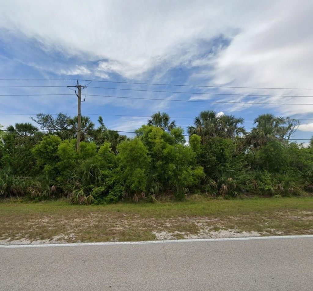 Photo of 4441 Collingswood Boulevard, Port Charlotte, FL 33948 (MLS # C7513071)