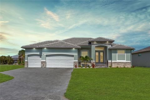 Photo of 209 Rotonda Boulevard S, Rotonda West, FL 33947 (MLS # O6302034)