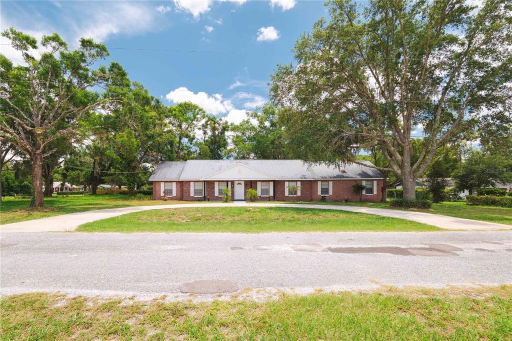 Photo of 1002 Friendship Lane, Lutz, FL 33548 (MLS # TB8403526)