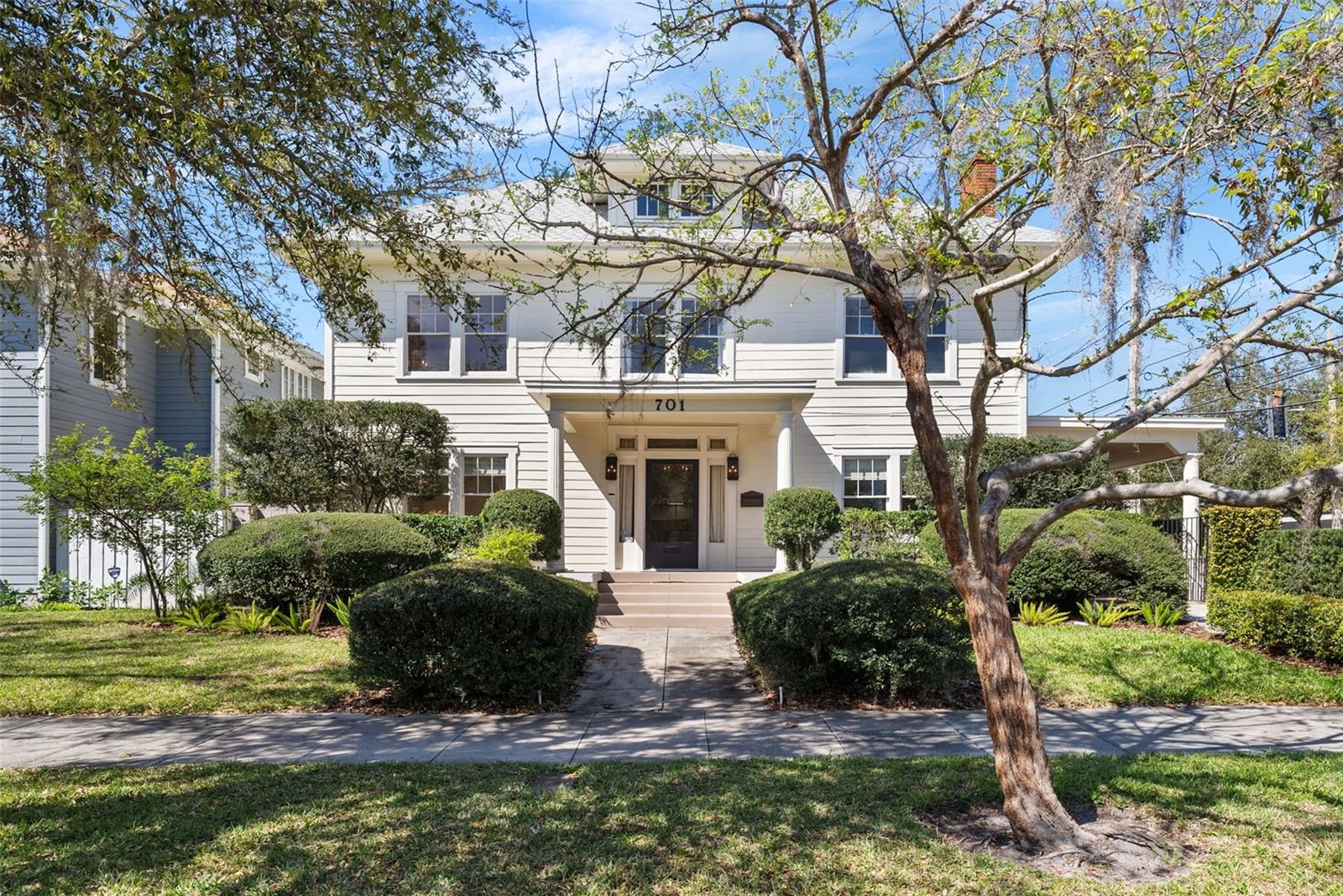 Welcome to this elegant historic house in Old Hyde Park’s Golden Triangle that has been lovingly restored and retained much of its original period features and charm. Standing high and dry, in a non-flood zone, yet within a short walk to the beautiful Bayshore Blvd, the property consists of a 4,382 sq. ft main house with a private pool and a 1,678 sq. ft carriage house with two separate apartments. The main house, built in 1922, has four bedrooms and four and a half bathrooms. There is an additional spacious third floor attic retreat/flex space with its own full bathroom. The home has been thoughtfully updated to meet the demands of modern life, while retaining its historic character and boasts many original features. French doors open out onto the pool and deck for shady morning breakfasts, sun drenched afternoons in the pool and evening entertaining under the stars. The Carriage House has a two bedroom/one bath apartment on the first level with 690 heated sq. ft and a two bedroom/one bath apartment on level 2 with 988 heated sq. ft. Each apartment has its own entrance and off-street parking space, washer/dryer and separate electric meters. Both apartments are currently legal rentals but may be converted back to their original role as garage and carriage house apartment. Mature landscaping front and back. Enjoy a premium public school district with the elementary and middle schools within a two-block walk, upscale shopping and dining in Hyde Park Village, close proximity to Bayshore Boulevard and the sparkling waters of Tampa Bay and thriving Downtown Tampa.
