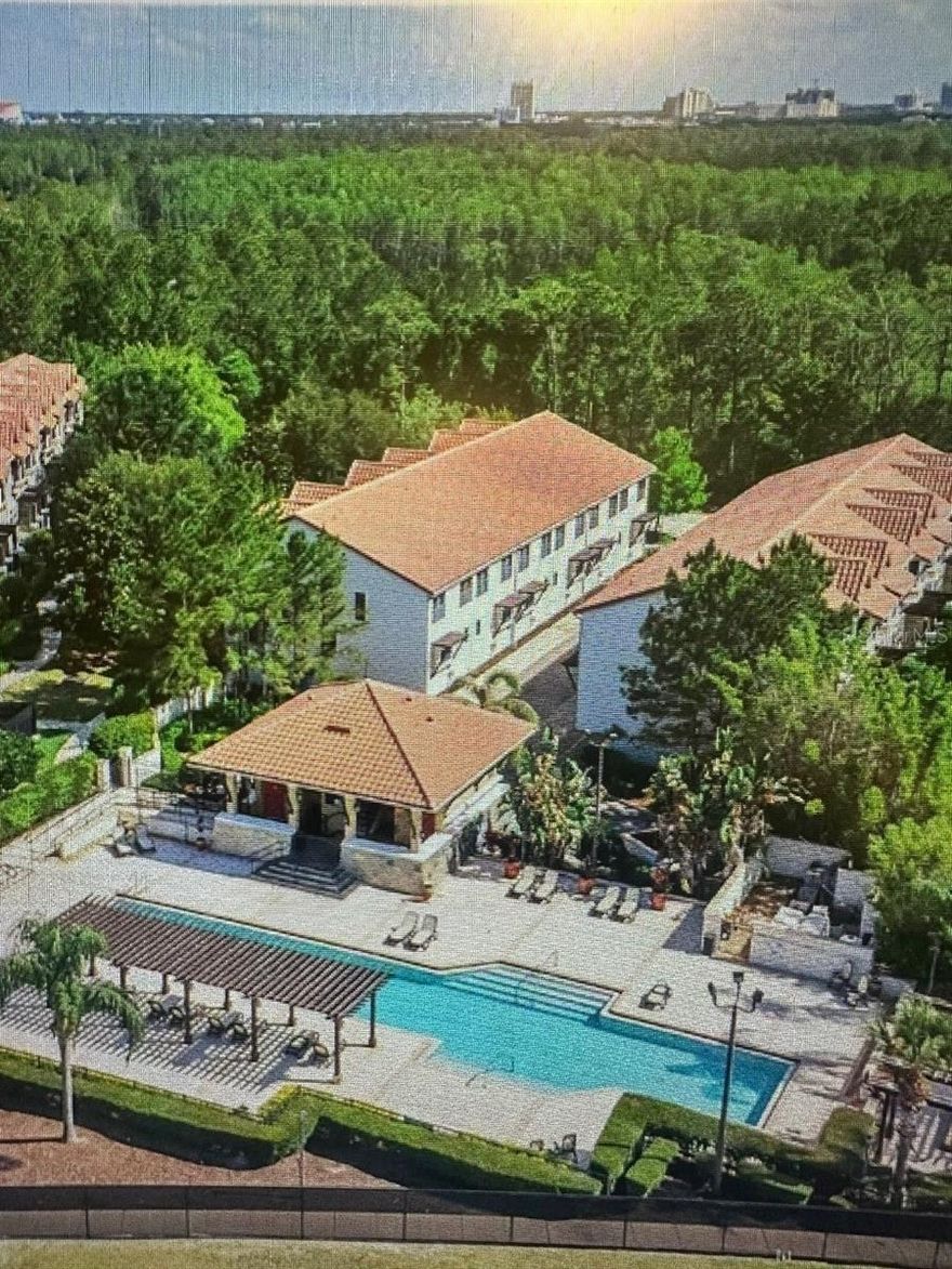 Amazing 4 Bedroom with 3.5 Bath Townhome.  Located in the Luxury of the Enchanted Garden Resort.  Ideal for Airbnb or Vacation Rental.  Fully Furnished with High Demand for Short Term Rentals.  Elegant Hard Wood Floors.  All elegantly remodeled and ready for immediate occupancy.   Freshly Interior and Exterior Painted.  Rental Investors Opportunity Awaits you.  Minutes away from Walt Disney Park, The New Universal Epic, Sea World and more.  Resort Amenities includes:  24/7 Gated,  Olympic sized Pool With Relaxing Hot Tub, Fitness Center, and much More.  A MUST SEE!