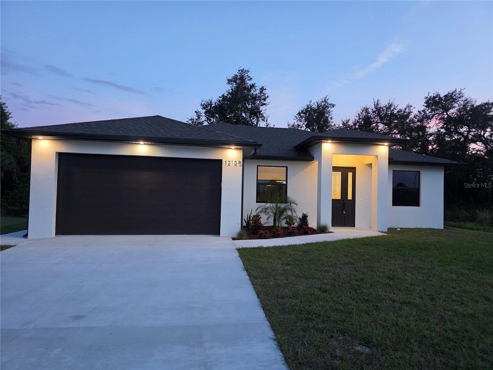 ***NEW CONSTRUCTION HOUSE***  
1703 sq ft living area, 3br/2bath/2car extended garage 20.5ft long . NO HOA's, NO CDD's fees!    This beautiful home includes many upgrades:      -WHOLE HOUSE REVERSE OSMOSIS.   -HURRICANE IMPACT LoE WINDOWS and doors.   -Fiberglass entry door.   -LUXURY VINYL flooring throughout.     -Kitchen upgrades include Premium grade stainless steel appliances AND laundry washer & Dryer.      -GUTTERS ALL OVER THE ROOF.   -Master bathroom features walk in shower and double Sinks.   -Utility sink in laundry room.   -Extra attic storage space.   -Quartz kitchen countertops.  **A lot of room LEFT for the pool**   -Plumbing and RANGE exhaust  and electric outlets available for future summer kitchen.  -Power outlets for smart toilet available -    -A short 1 minute drive to the Famous Warm Mineral Spring Park which provides visitors with a number of therapeutic and passive recreation options.