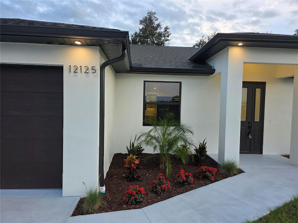 Photo of 12125 Madrid Avenue, North Port, FL 34287 (MLS # TB8442619)