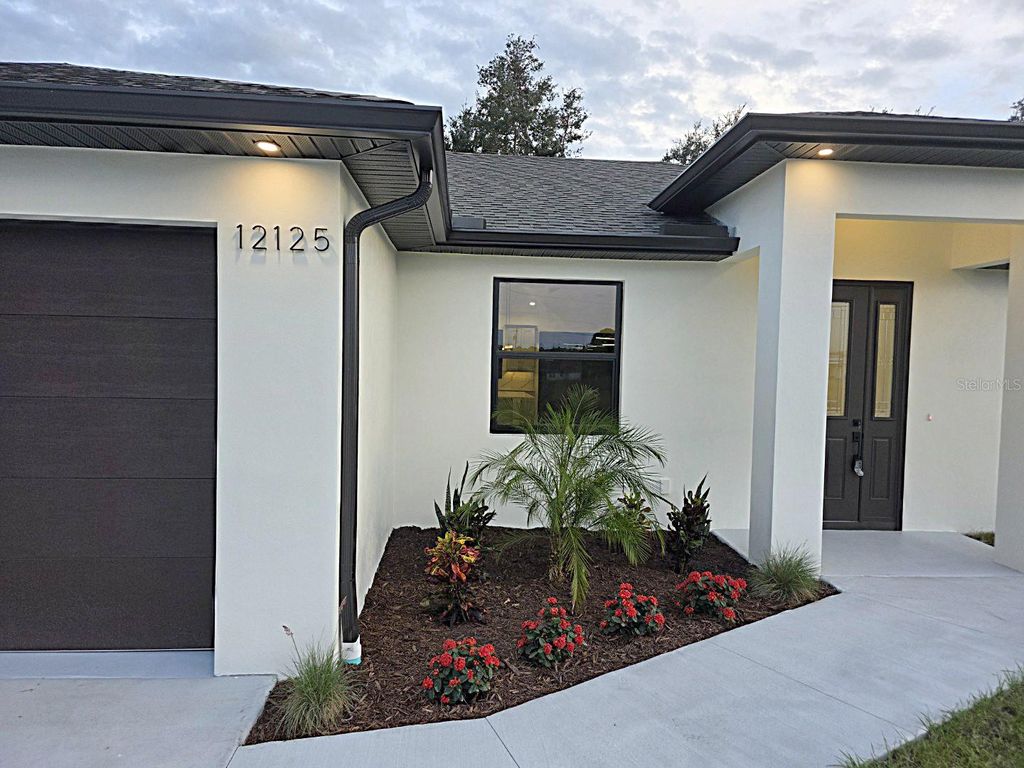 Photo of 12125 Madrid Avenue, North Port, FL 34287 (MLS # TB8442619)