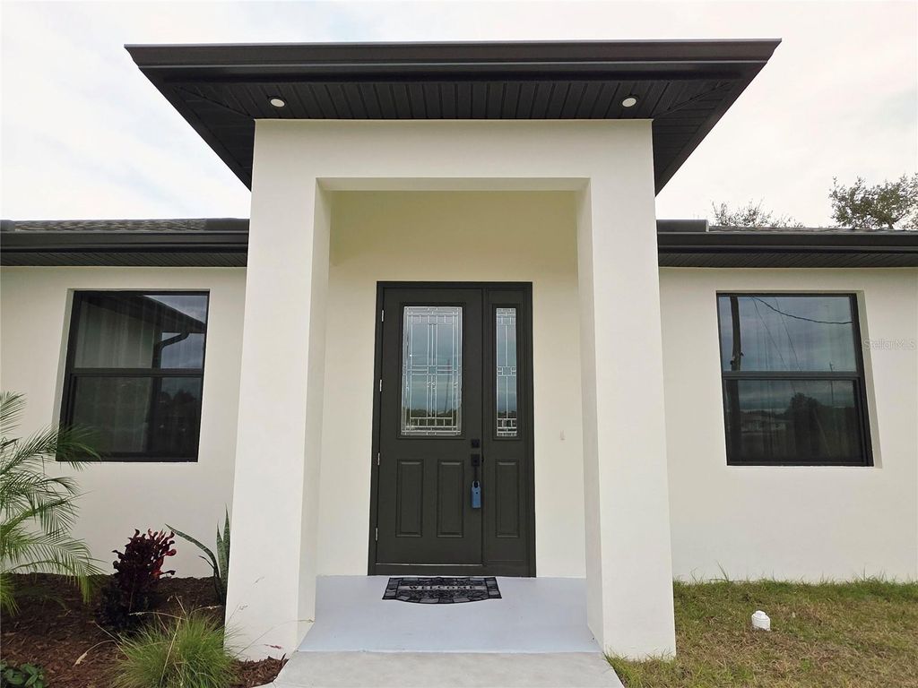 Photo of 12125 Madrid Avenue, North Port, FL 34287 (MLS # TB8442619)