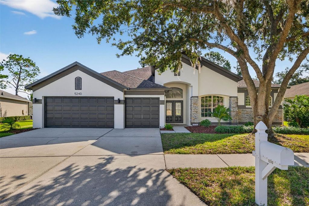 Photo of 5240 Silver Charm Terrace, Wesley Chapel, FL 33544 (MLS # TB8439256)